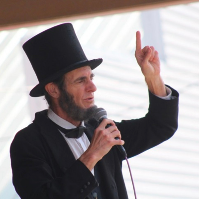 A picture of an Abraham Lincoln impersonator.